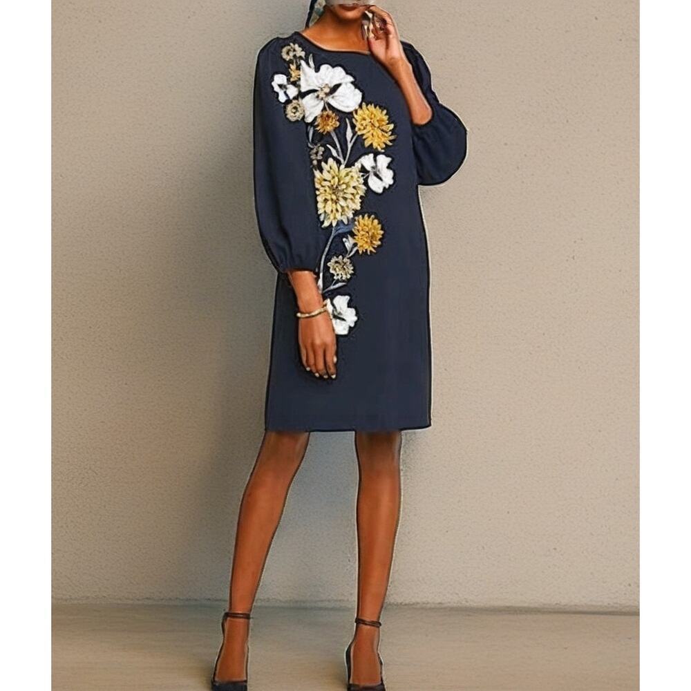 Ann Taylor Factory navy blue floral sheath dress with puff sleeves.